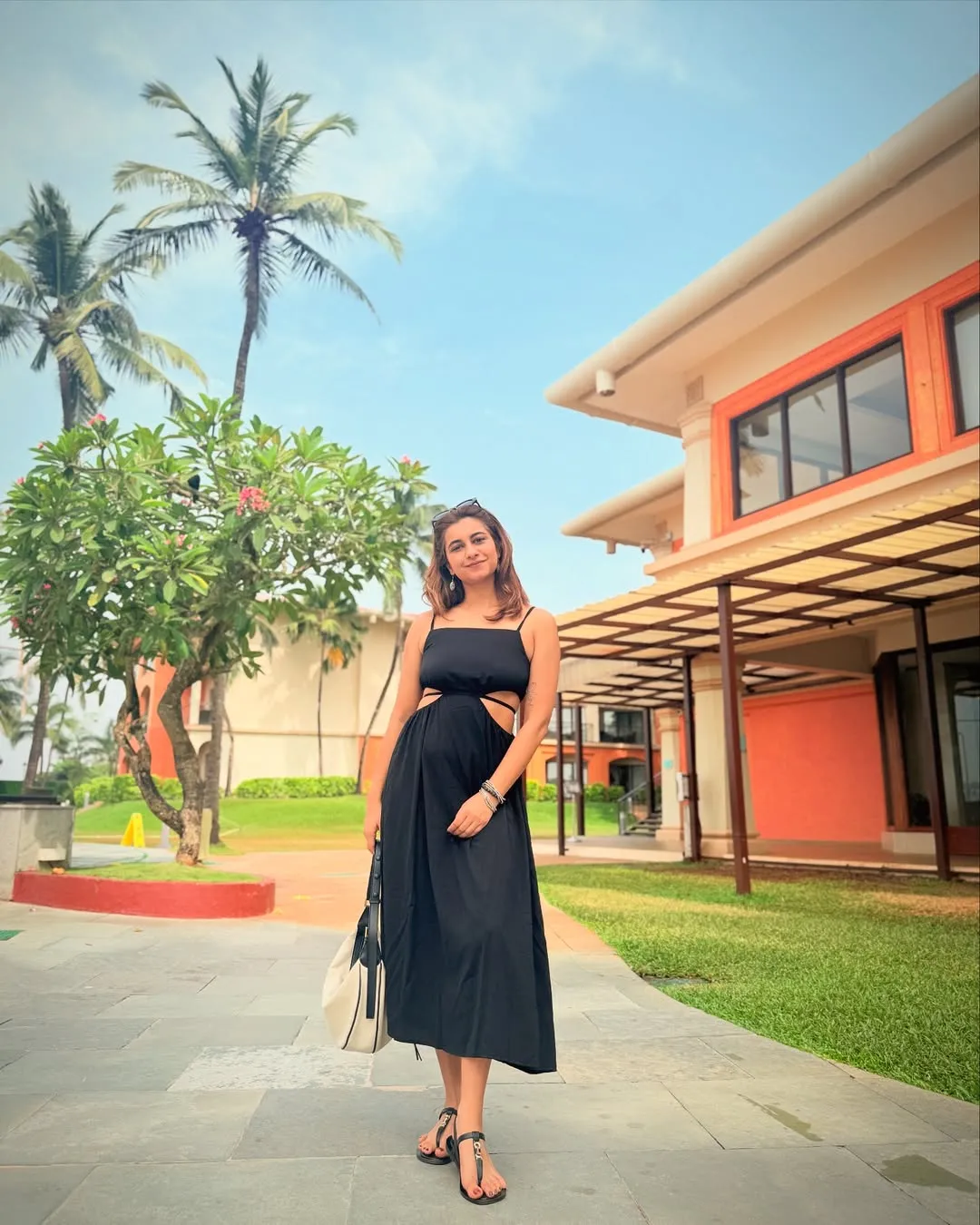 Black dress with designer waist cuts